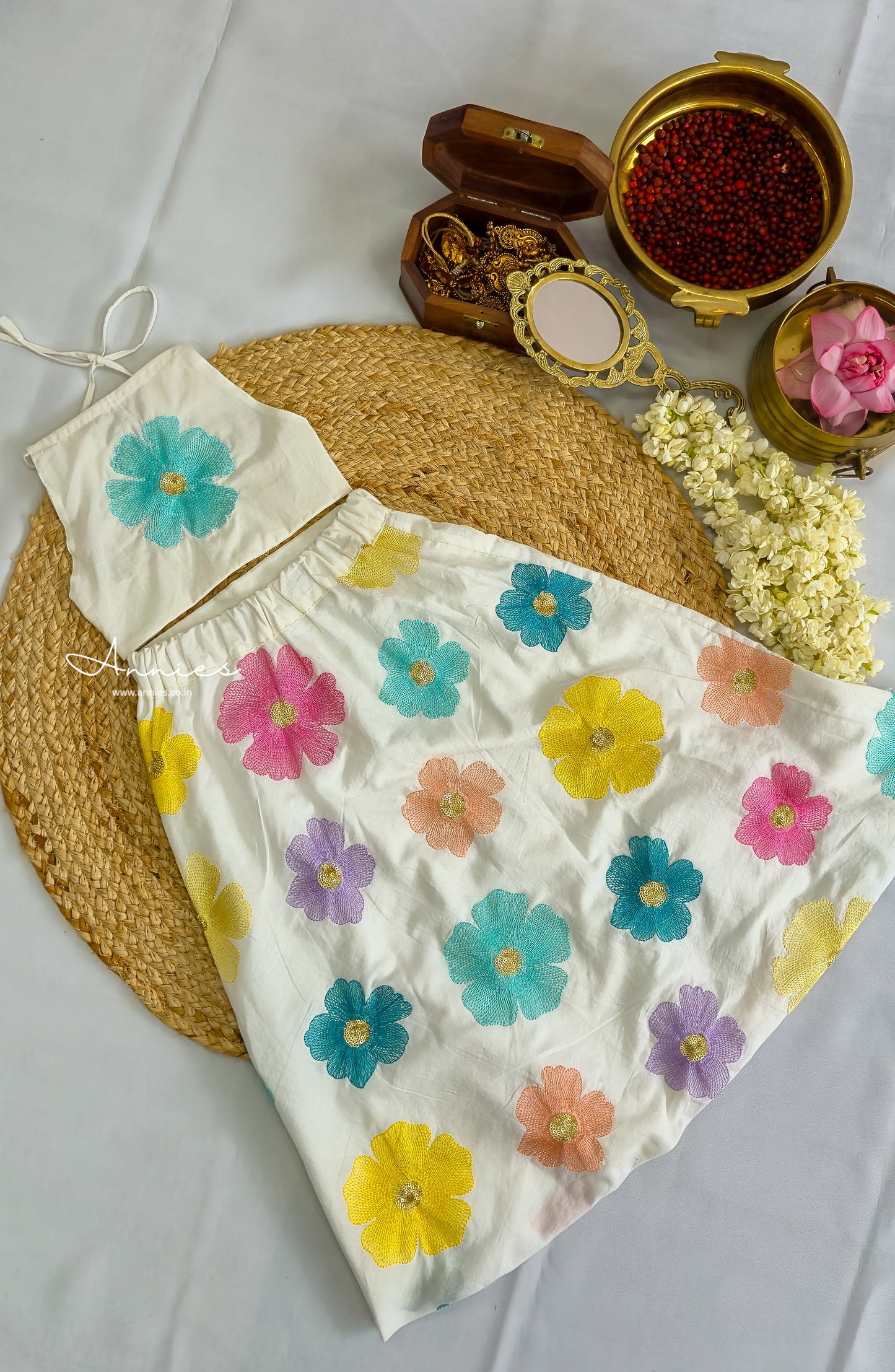Girls skirt and top with floral pattern by annies.co.in