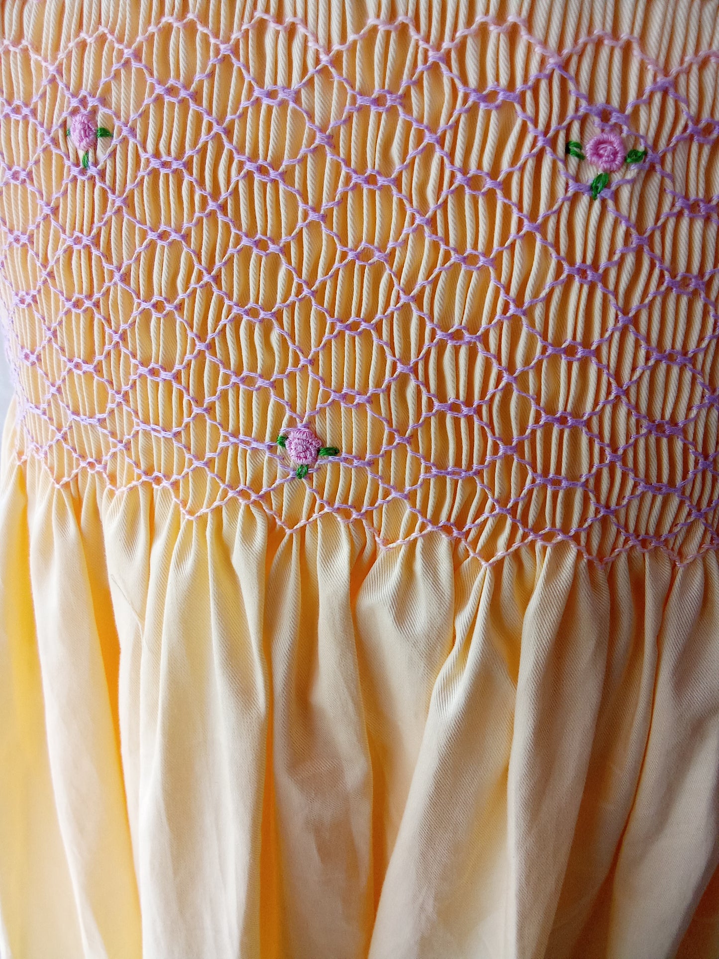 Hand Smocked Yellow Dress Smocking Closeup by annies.co.in