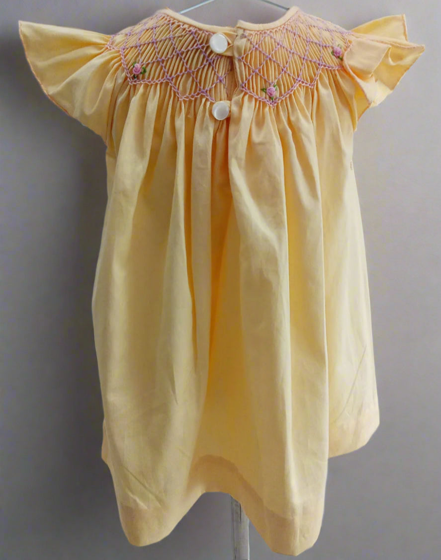 Handmade Yellow Smocked Bishop Dress for Babies by annies.co.in