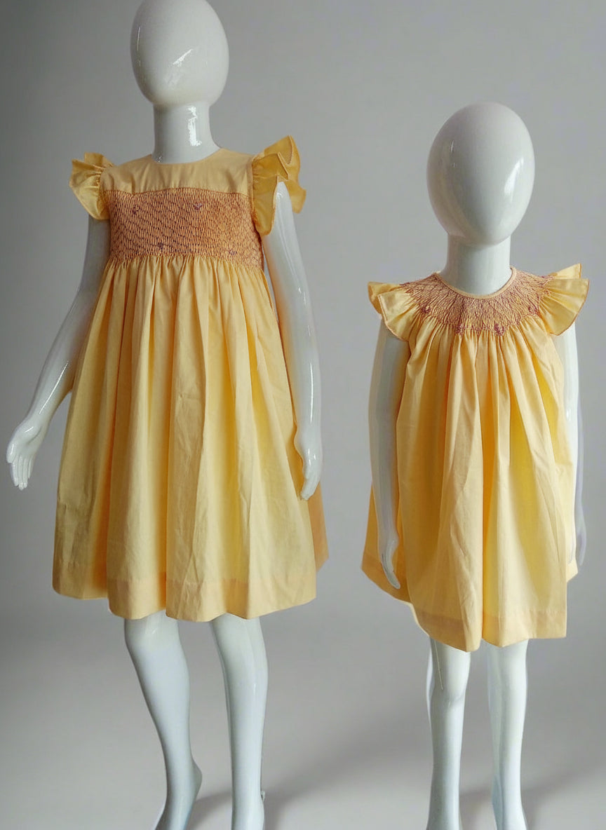 Handmade Yellow Smocked Bishop Dress for Babies by annies.co.in