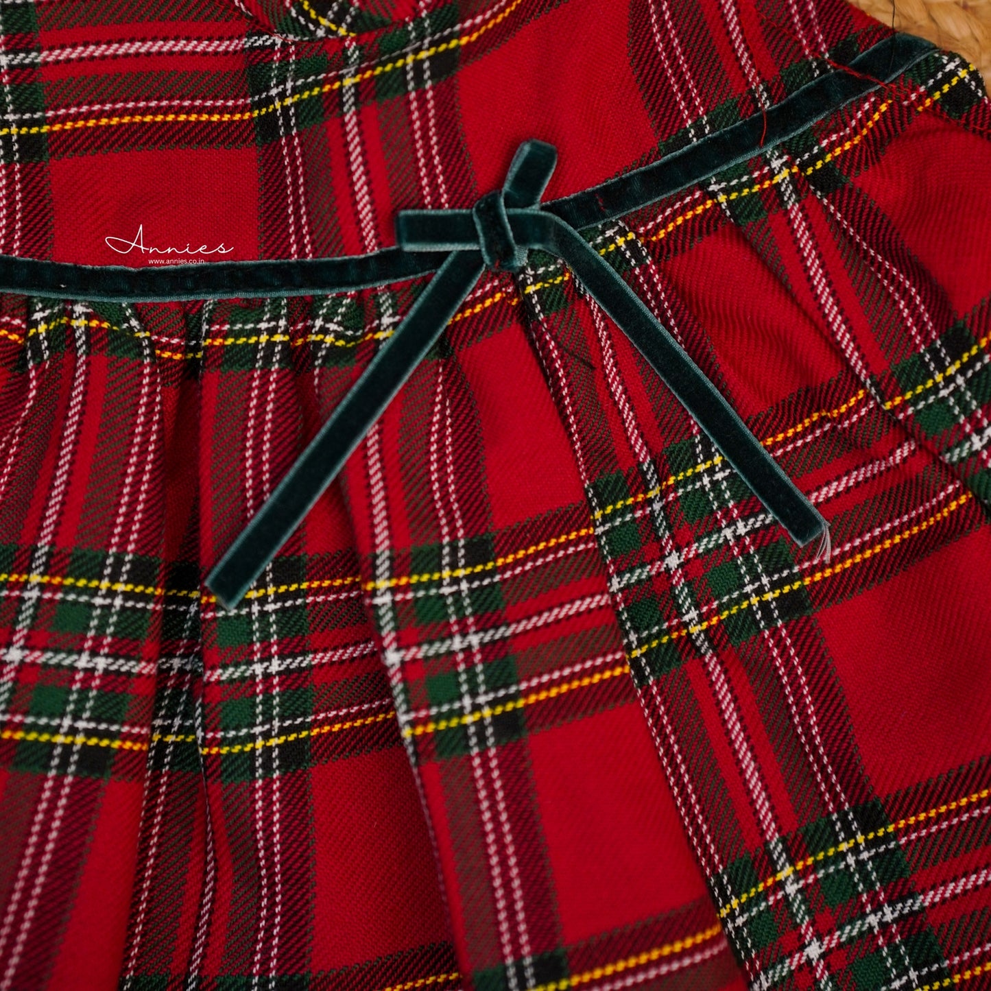 Red plaid dress with a black belt and 'Annie's' branding.