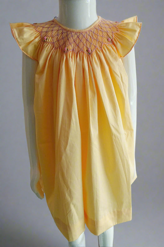 Handmade Yellow Smocked Bishop Dress for Babies by annies.co.in