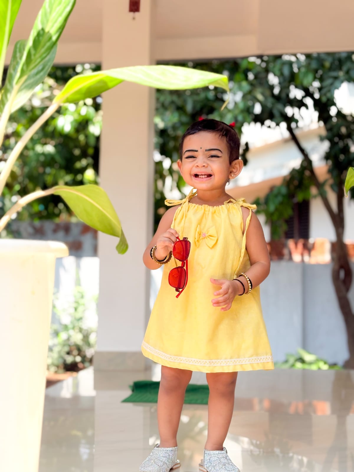 Yellow Pillowcase dress with a bow