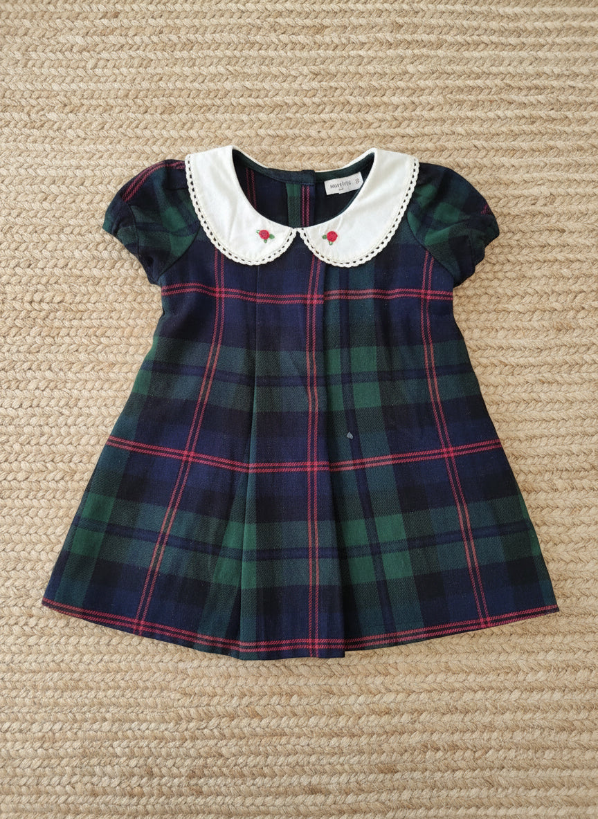 Plaid dress with a white collar on a white background