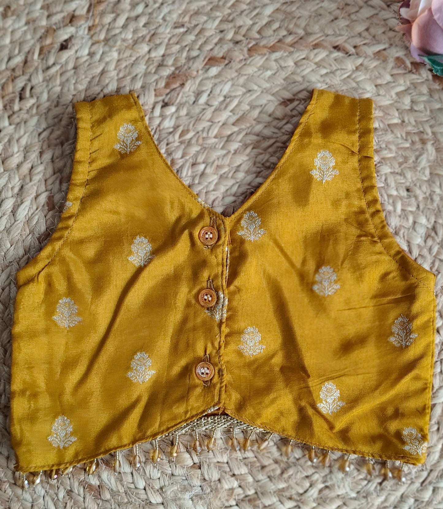 Swarna Dalam mustard yellow V-Neck sleeveless blouse