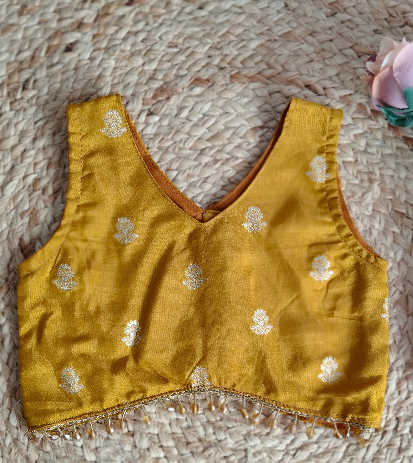 Swarna Dalam mustard yellow V-Neck sleeveless blouse